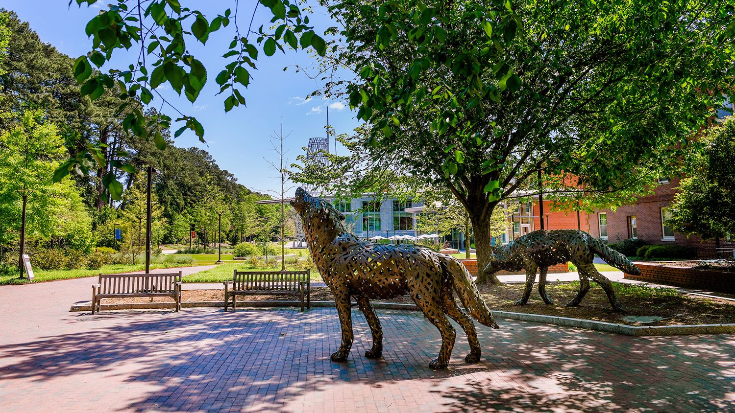Copper wolves stand by the walkway to Stafford Commons and Talley Student Center. Photo by Becky Kirkland.
