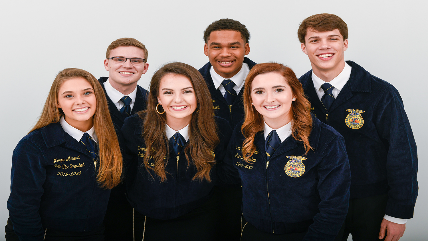 Group of young adults in uniforms