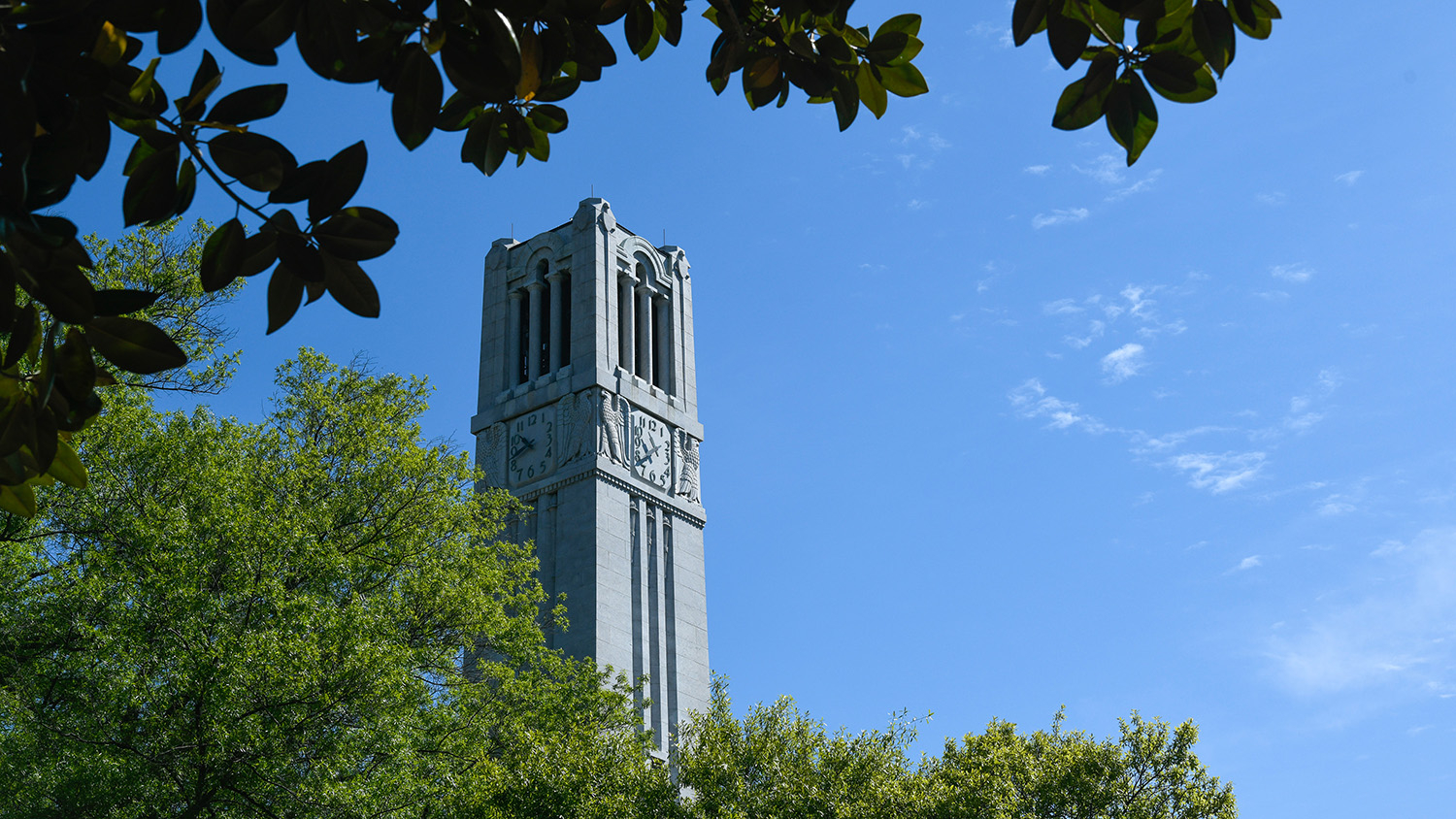 NCSU Bell Tower upward view in front of a blue sky