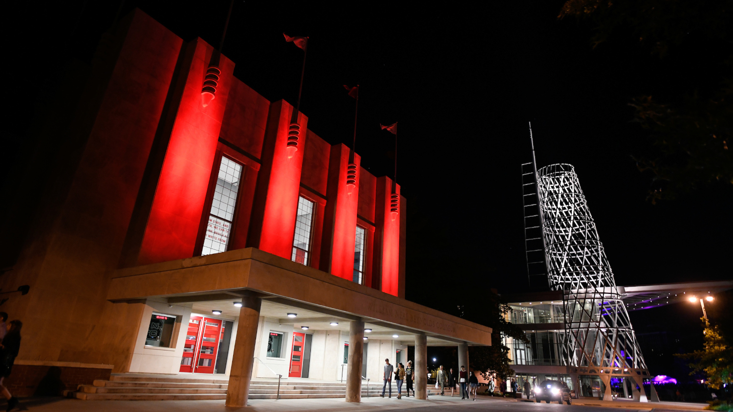 Talley student union and Reynolds coliseum at night. Photo by Marc Hall