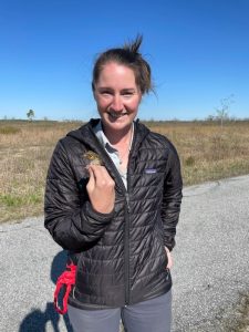 Emily Nastase with a sparrow.