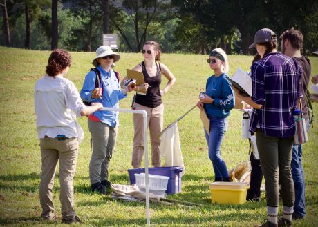 Erin McKenney with students during field ecology class