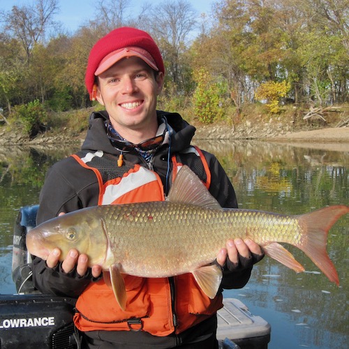 Corey Dunn holding a fish