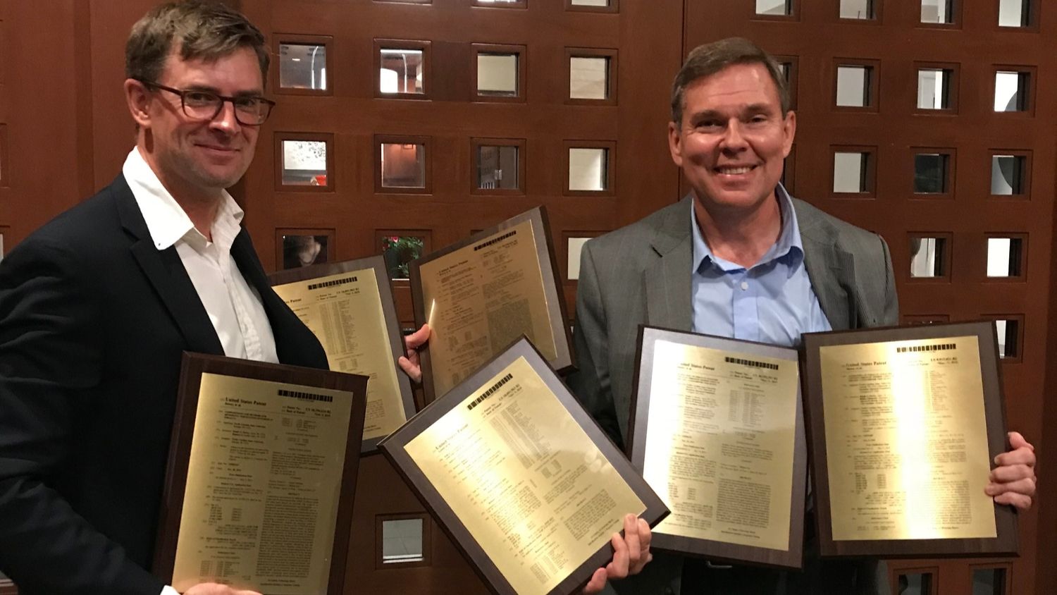 NC State Crop and Soil Sciences researchers Ramsey Lewis and Ralph Dewey were recognized for plant and genetic innovation patents at an NC State awards ceremony in 2019.
