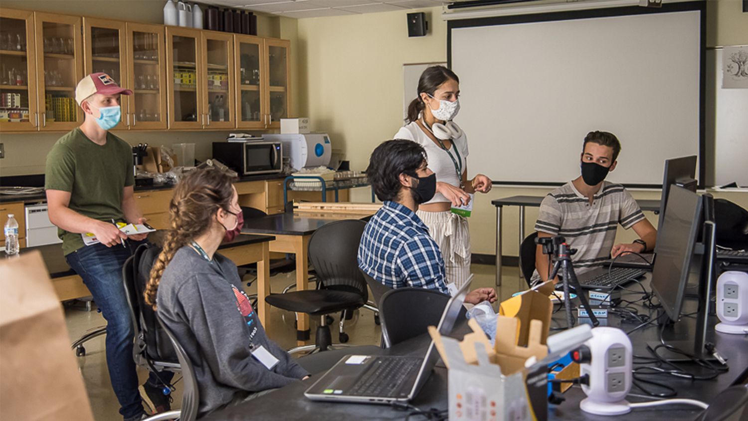 Students collaborate in a classroom during the Hackathon