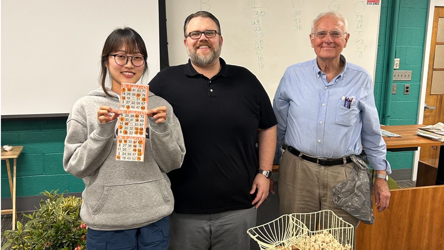 NC State CALS graduate student Seongmin Park poses with a winning bingo card.