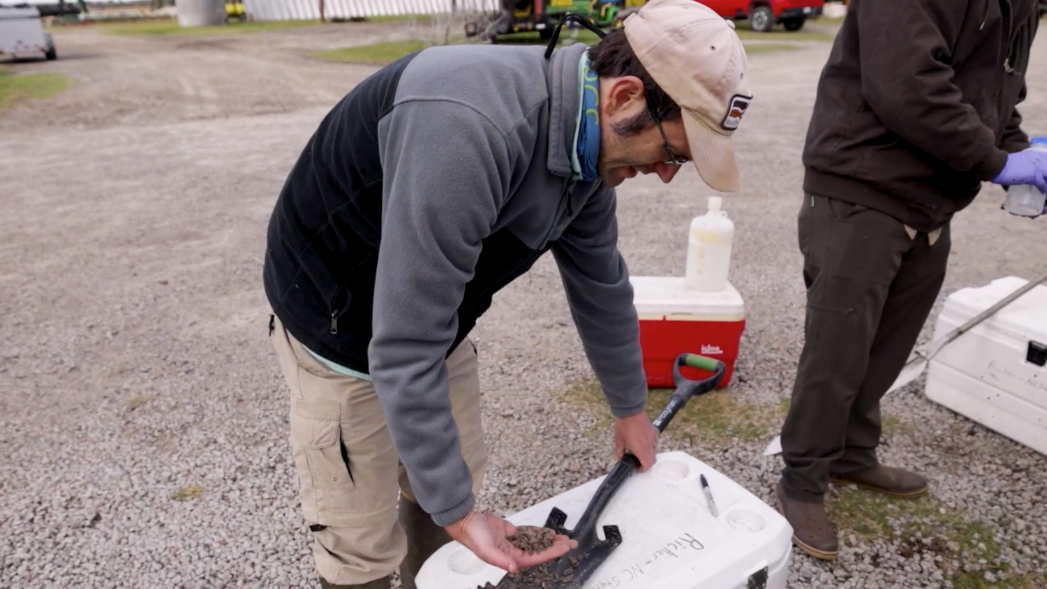 Soil scientist Matt Ricker examines a soil sample in Hyde County, NC.