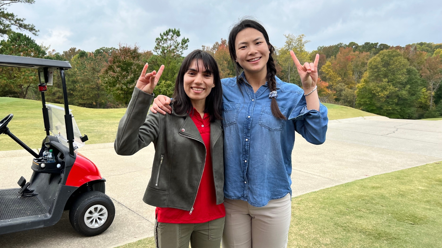 NC State's Qiyu Zhou and graduate student at NC State's Art Bruno Golf Tournament.