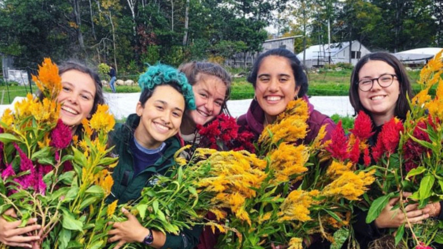 Evelyn McAdam with friends and flowers at the Maine Coast Semester School. 