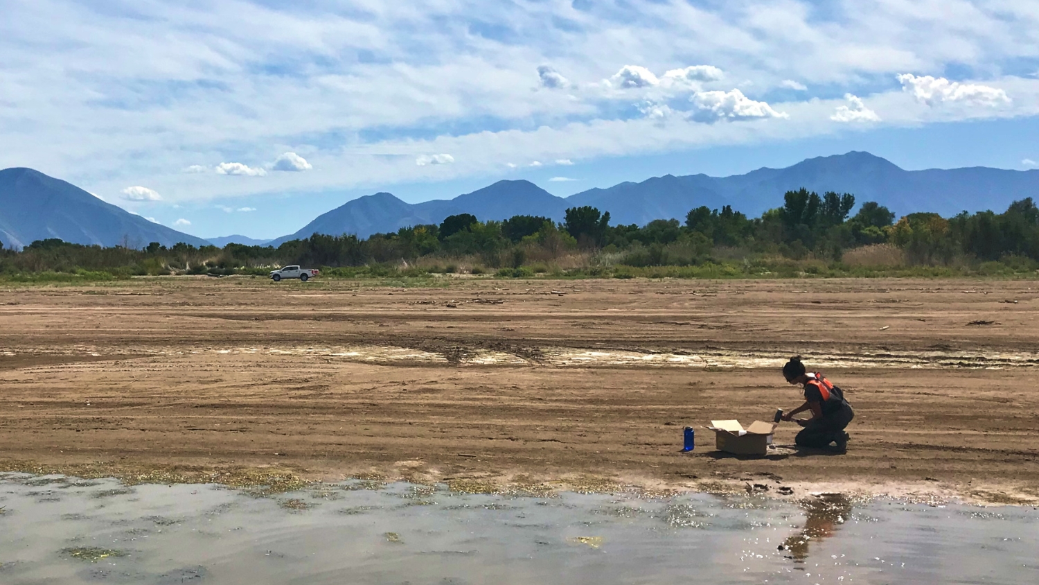 NC State's Erin Rivers takes water samples at Utah Lake