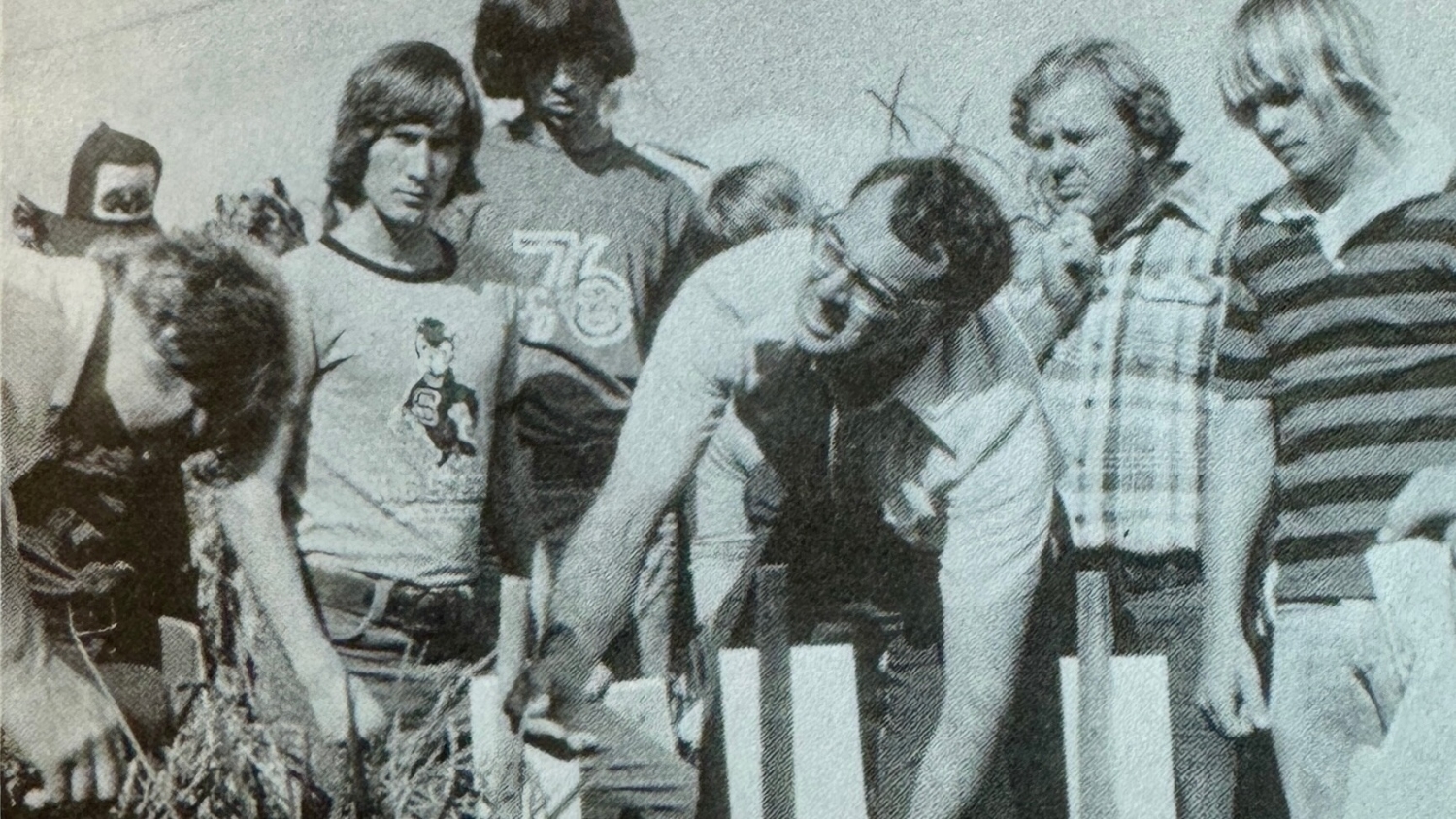 old black and white photo of people taking soil samples