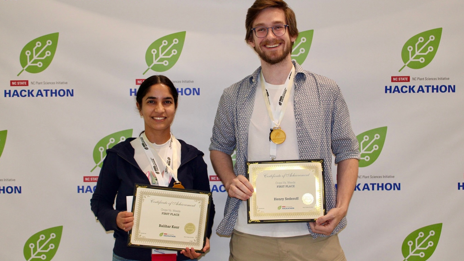 Balihar Kaur poses with her team partner after winning the 2024 N.C. PSI Hackathon in weed identification