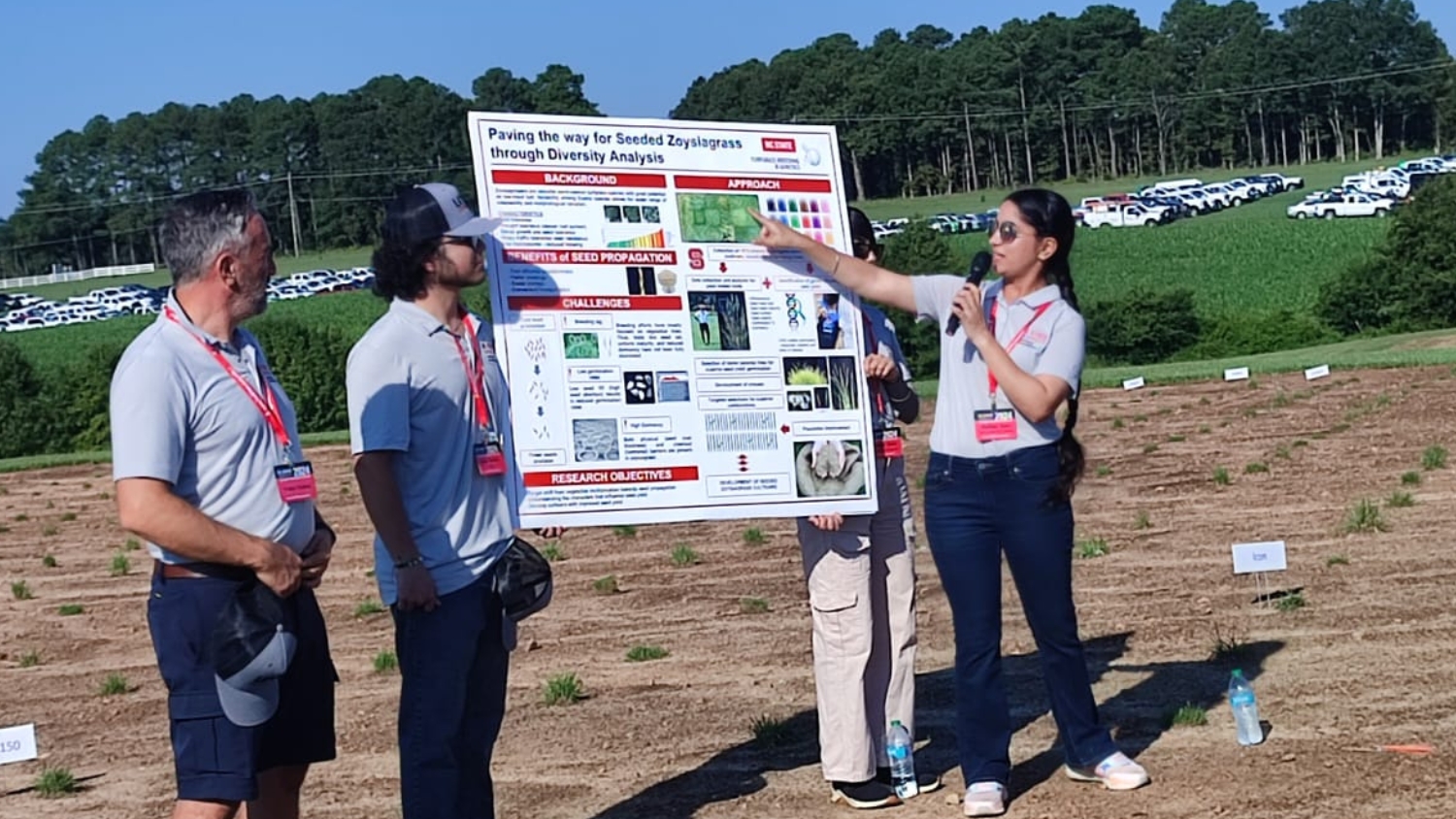 Balihar Kaur presents research at an NC State turfgrass field day stop