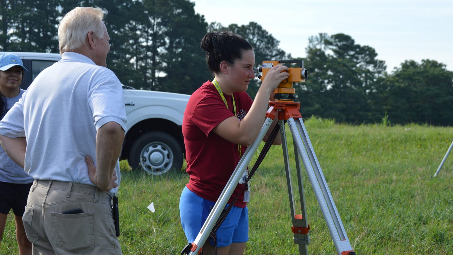 NC State RCW participant learns to use survey equipment