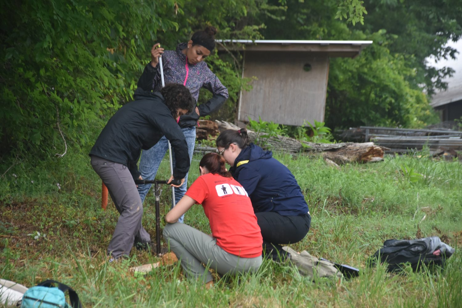REU Students gets hands-on training in soil sampling