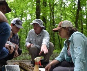 Professor Josh Heitman with students