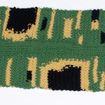 Image of a hand crafted scarf resembling a infected banana peel