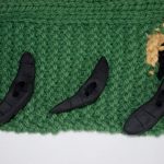 Close up photograph of a hand crafted scarf created for the APS Art Competition.