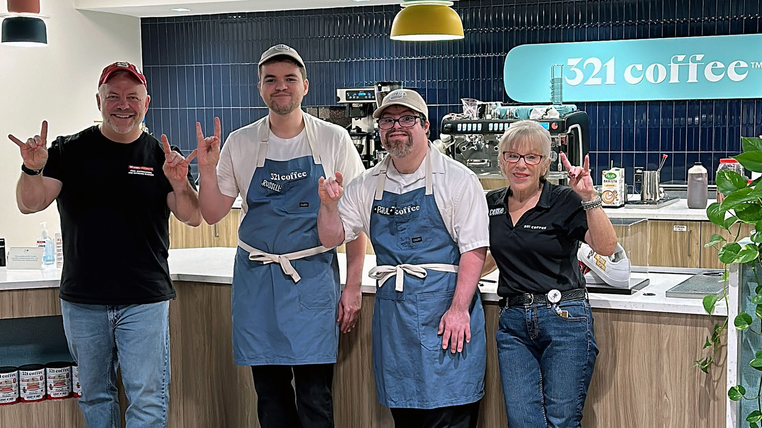 Food scientist Keith Harris with three team members at 321 Coffee