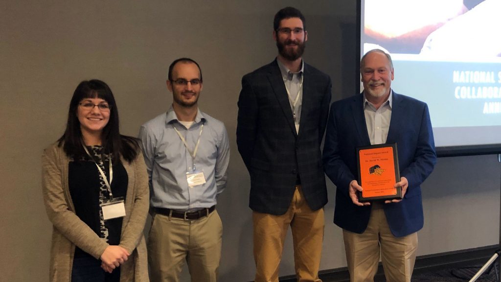 From left to right: Madison Stahr, Cole Smith, Levi Moore, and David Monks awardee recipients at the National Sweetpotato Collaborators Annual Meeting.