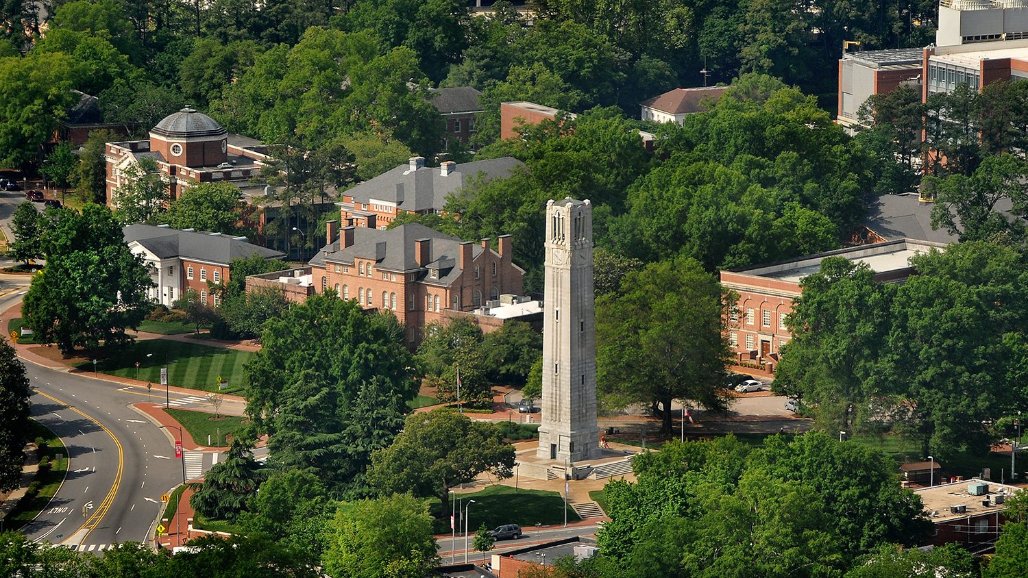 Aerial of Memorial Belltower and surrounding buildings on campus.