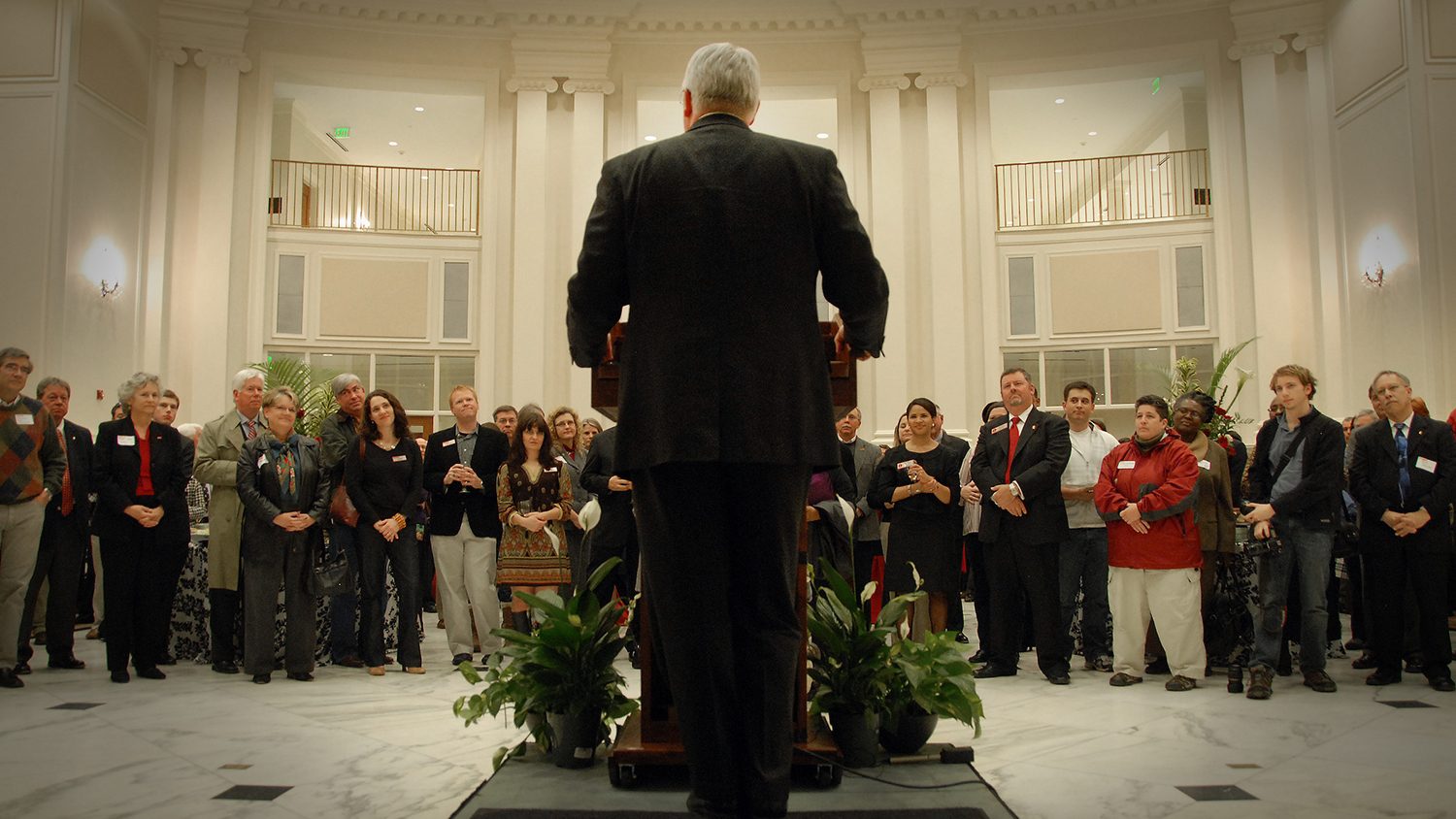 Chancellor Woodson standing at a podium