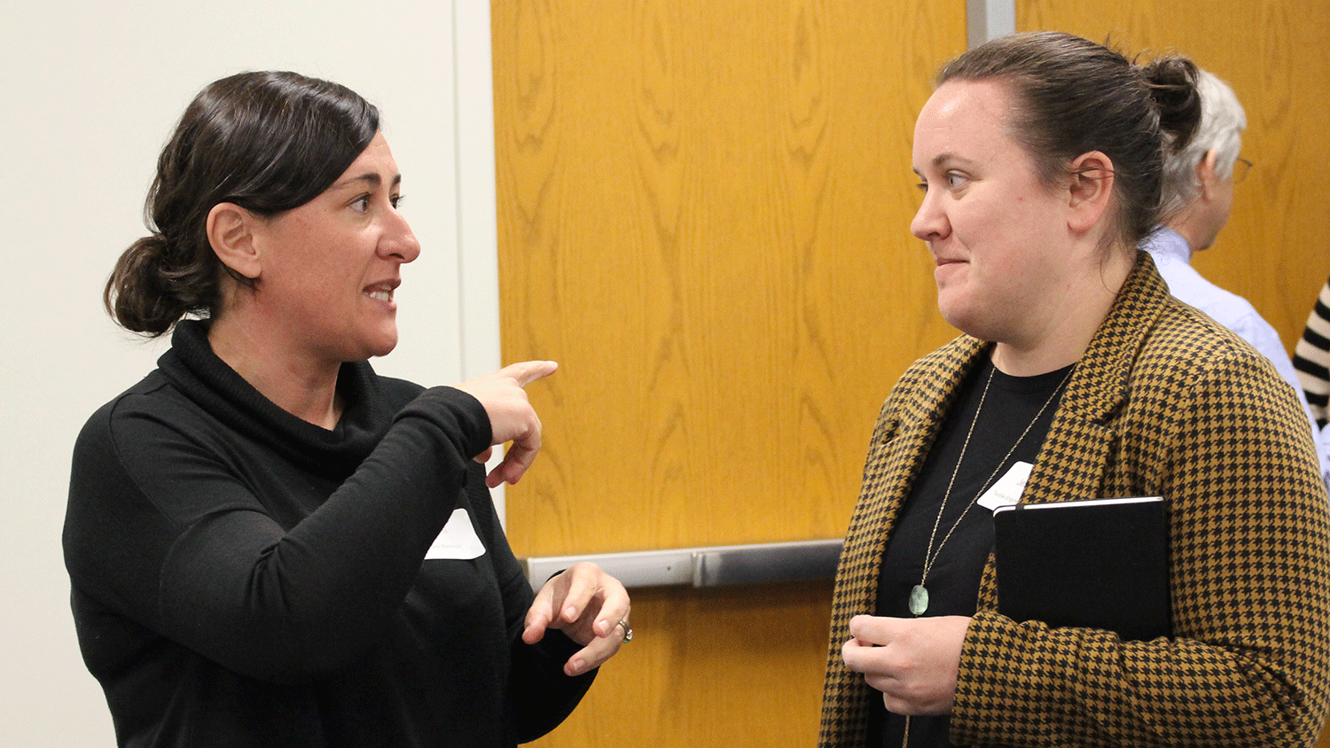Ross Sozzani, an associate professor in Plant and Microbial Biology, talks with Jessica Gluck, an assistant professor of Textile Engineering, during the Nov. 13 ideation session