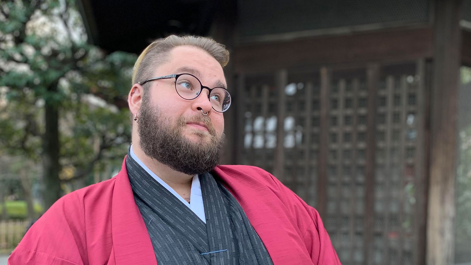 White male in red and black jacket