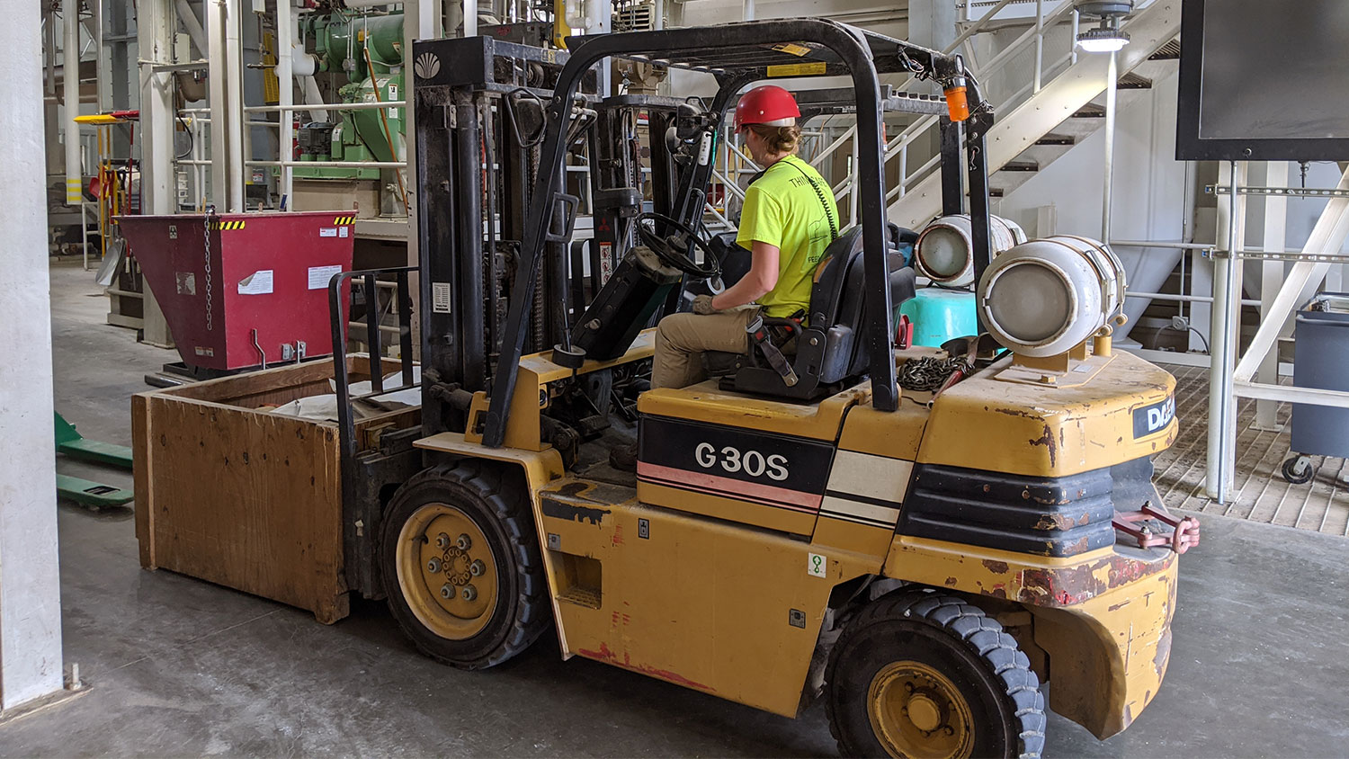 Person driving a forklift