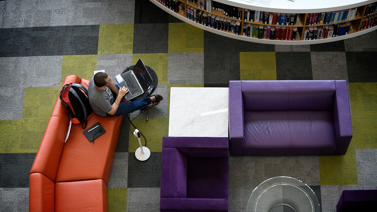 Purple and orange couch overhead view.