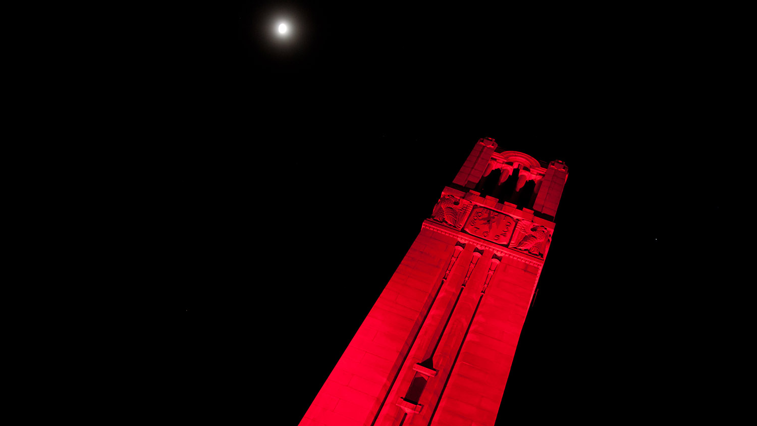 Bell Tower up lit red.