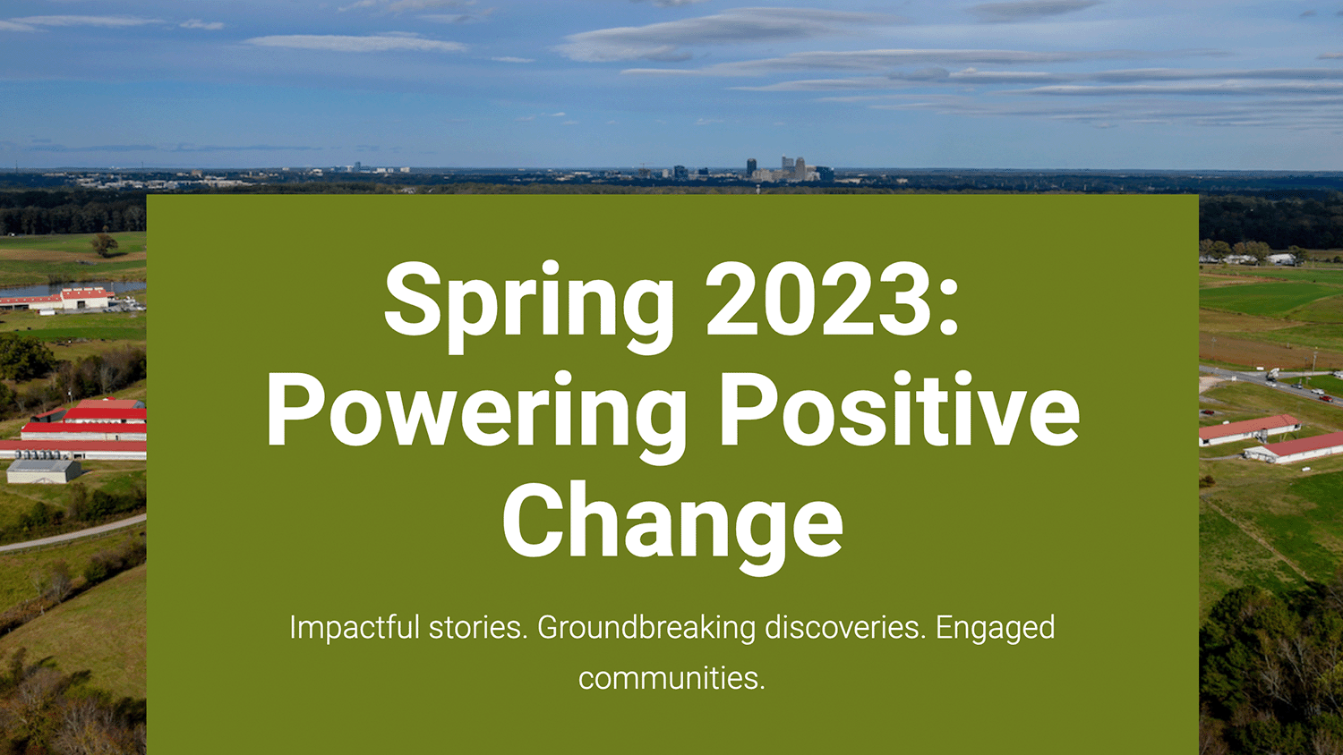 Farm image in the background and banner with Powering Positive Change