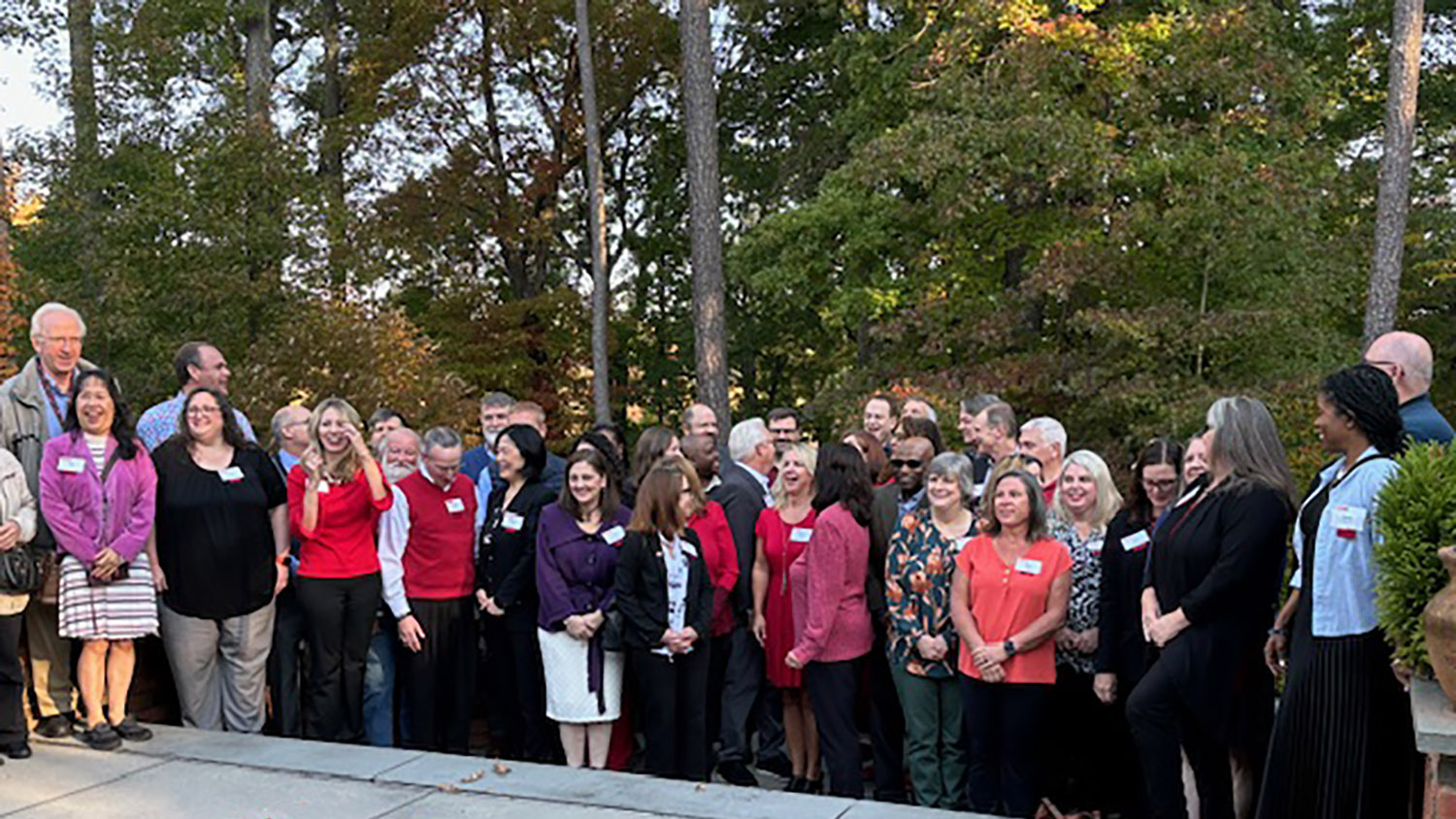 a group of people stand outside