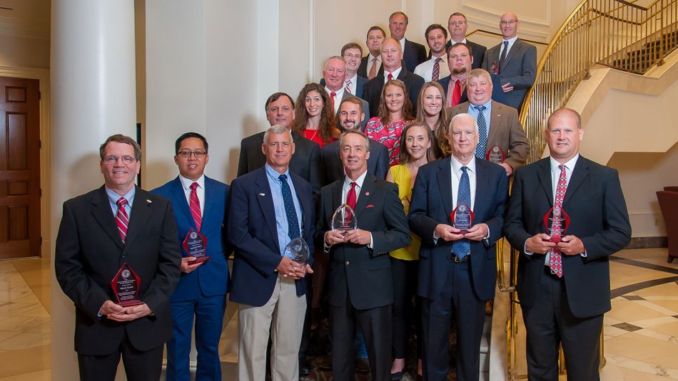 CALS Alumni Award recipients gather to take a group photo.