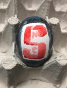 colored egg with the NC State block S