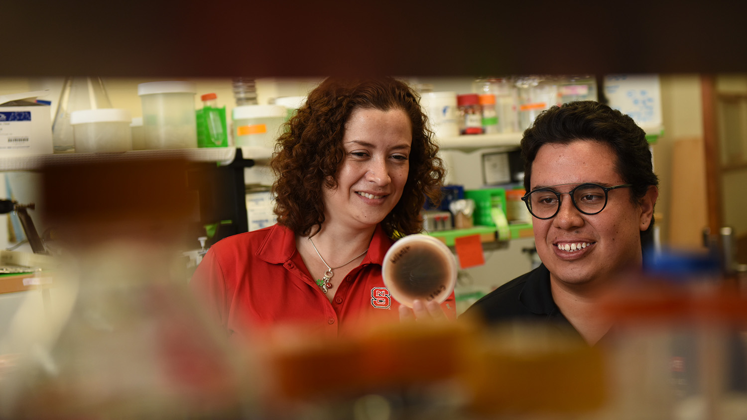 Ph.D. candidate Camilo H. Parada Rojas, right, works in the lab with mentor Lina Quesada-Ocampo, Ph.D.