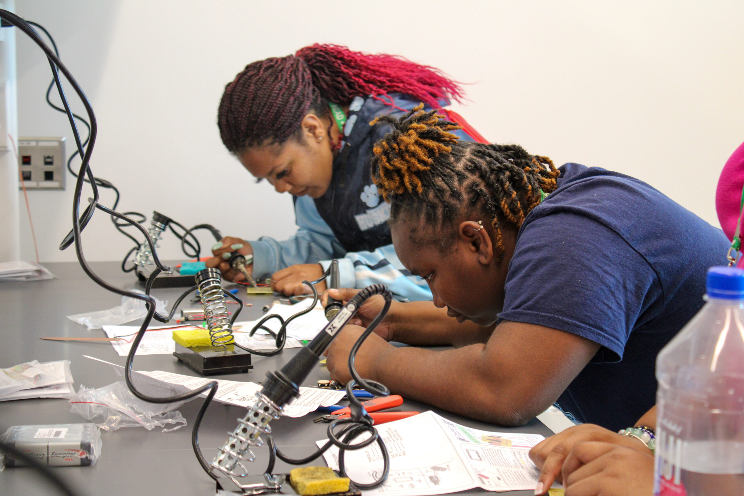 High school students from the Horticultural Science Summer Institute learn to make soil sensors in the N.C. PSI Demo Lab.