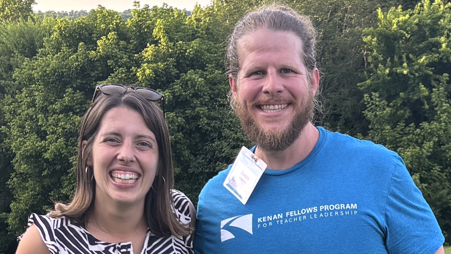 Two people smiling together