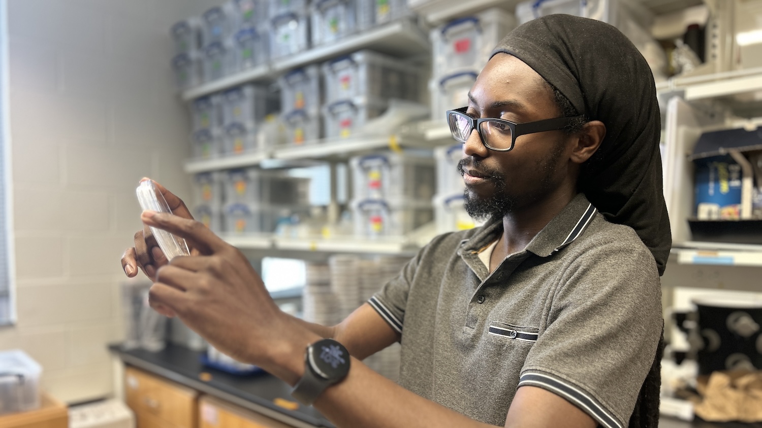 Xavious Allen examines a fungus.