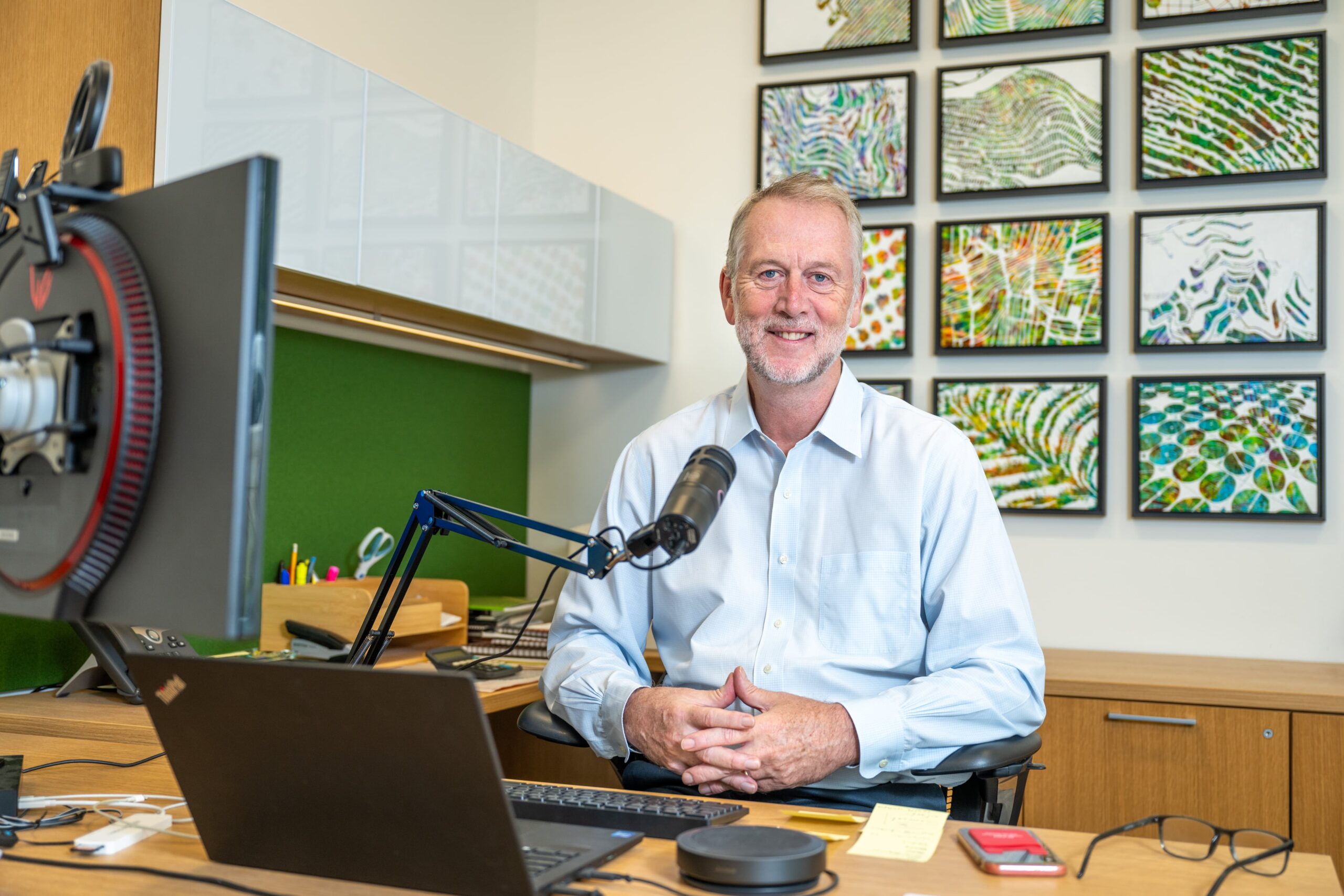 Adrian Percy with podcast equipment