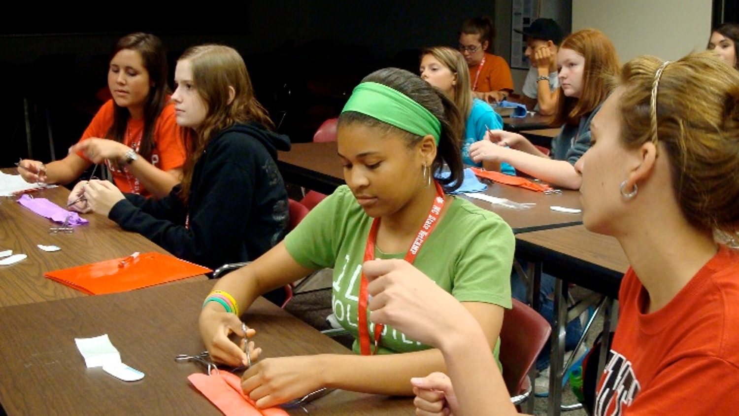 Campers get acquainted with the tools needed for stitching up sutures.
