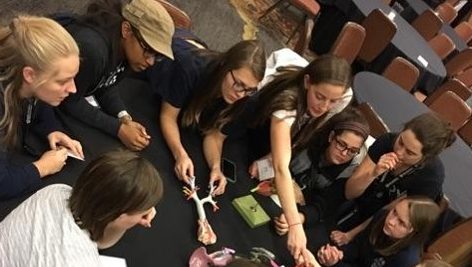 students around a table