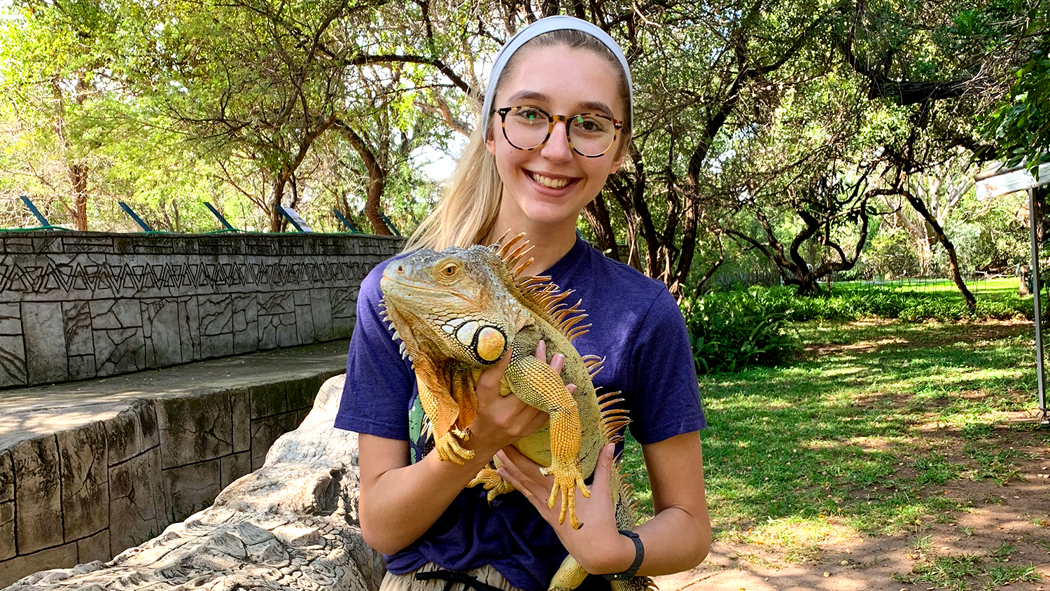 girl with an iguana