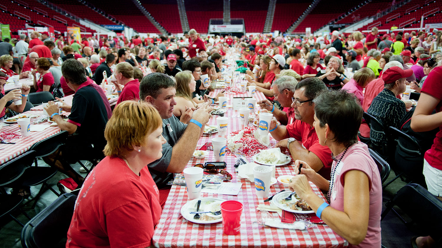 Image of people eating at CALS Tailgate