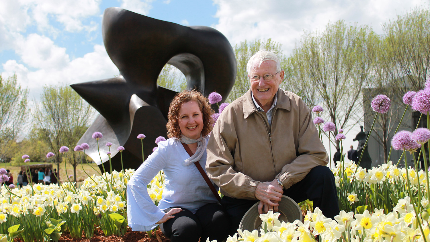 Julieta Sherk and August de Hertogh in their garden outside the NC Museum of Art