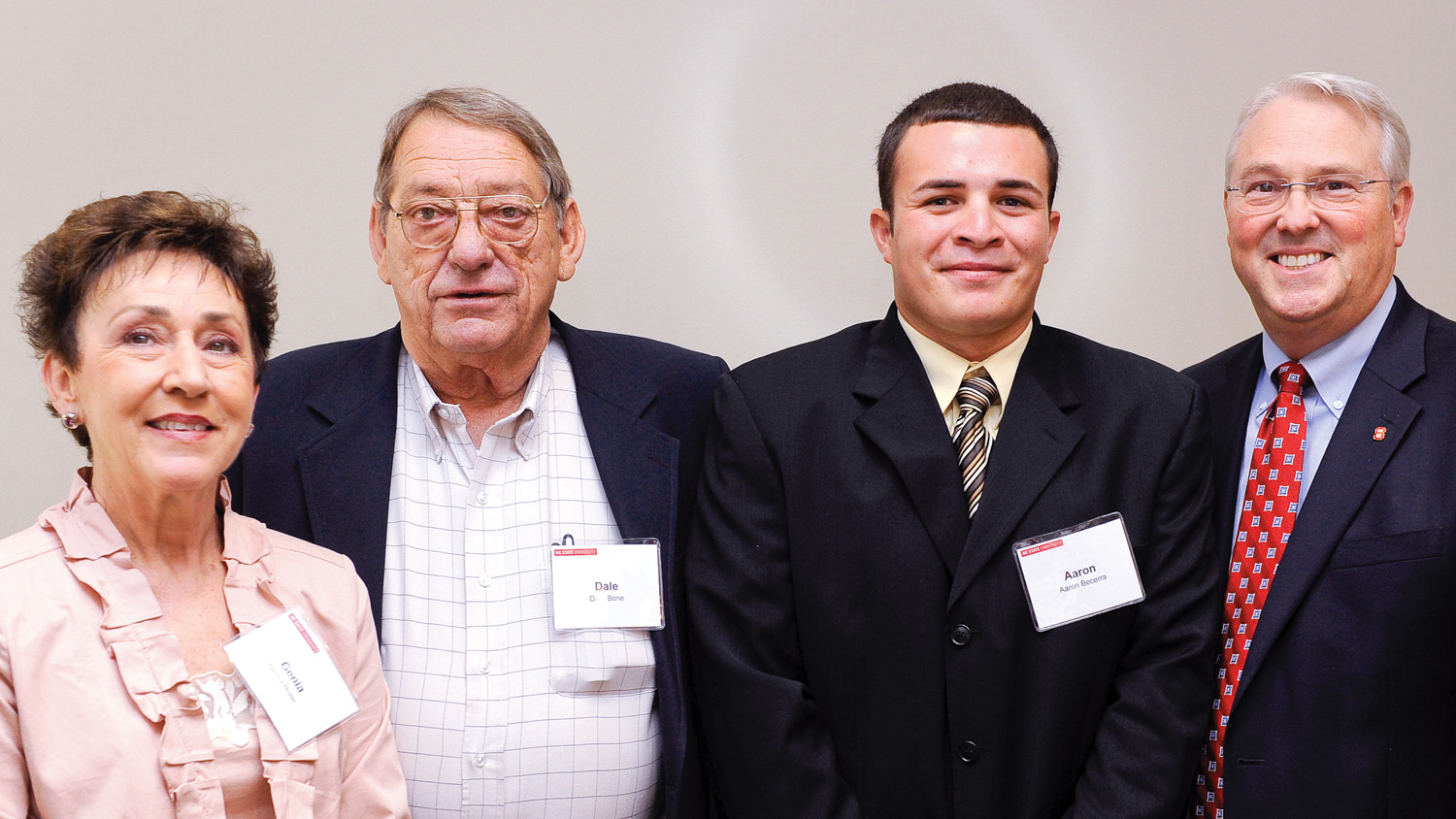 Genia and Dale Bone (left) with Bone Scholar Aaron Becerra and NC State Chancellor Randy Woodson (far right).