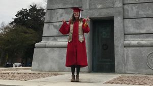 Valedictorian Abby Brown in front of NC State's Memorial Belltower.