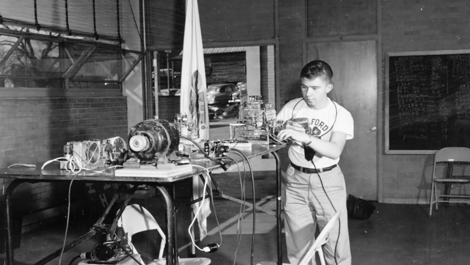Boy with electrical experiment.