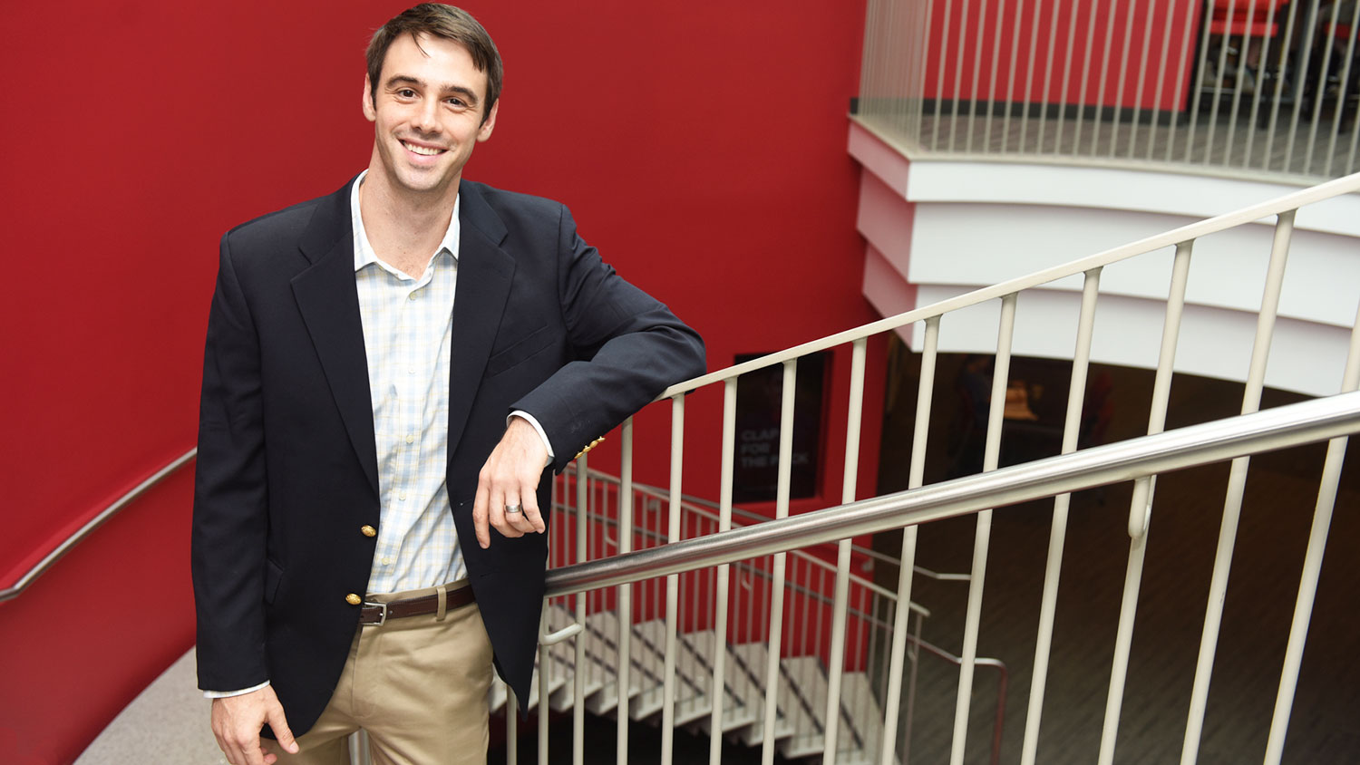 CALS student Mike Jones standing on a staircase