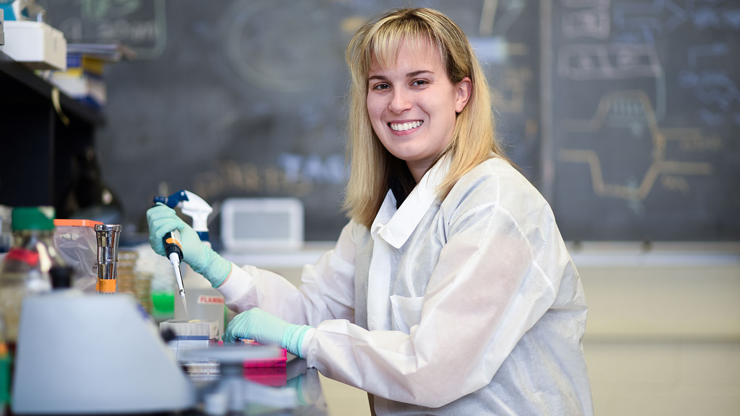 NC State doctoral student Katelyn Brandt working in a lab
